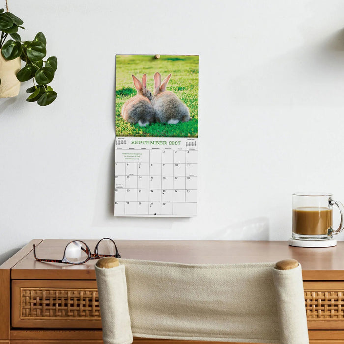 This Hallmark Whiskers and Paws 2027 Mini Wall Calendar features 12 months of heartwarming pet artwork.