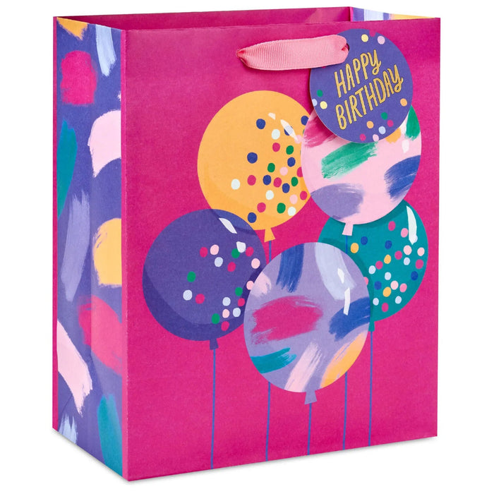 Hallmark 9.6-inch Bright Balloons on Fuchsia Medium Birthday Gift Bag featuring colorful balloon artwork and a cheerful design for birthday gifts.
