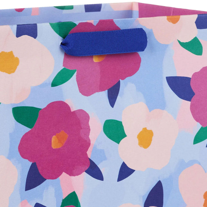 This Hallmark 9.6" Bold Floral Print Medium Gift Bag features a vibrant, bold floral print that makes your present stand out instantly.