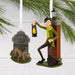 Disney Haunted Mansion Christmas ornaments set with caretaker and dog in themed storage box.”
