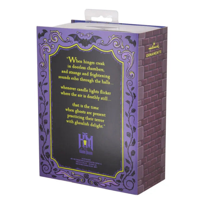 Purple decorative box with Halloween-themed text and design Disney Haunted Mansion Christmas ornaments set  on a white background ”
