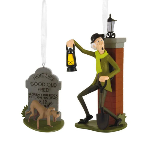 Disney Haunted Mansion Christmas ornaments set with caretaker and dog on white background.