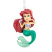 Mermaid figurine ornament with red hair and green tail on a white background