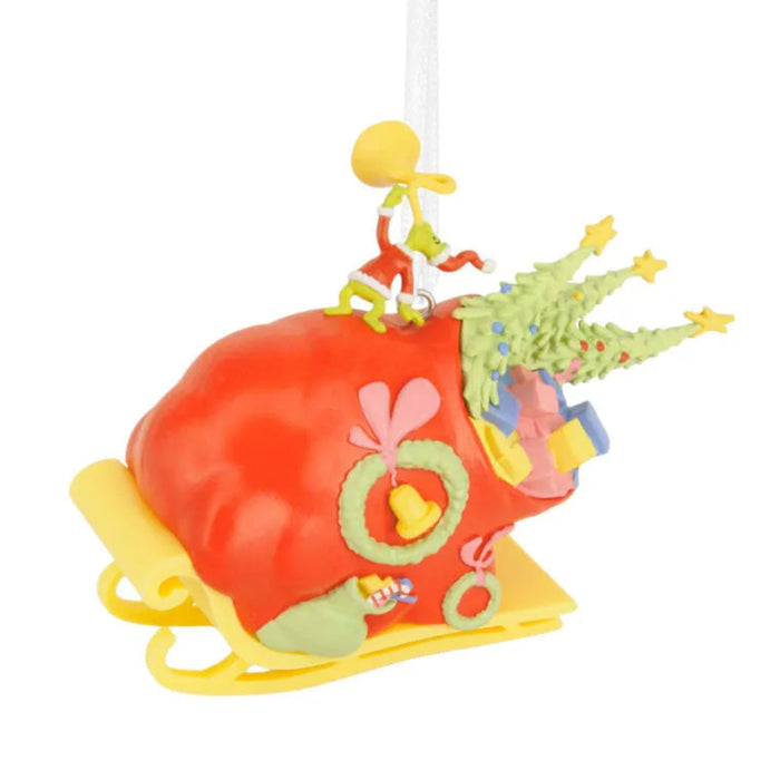 Dr. Seuss's How the Grinch Stole Christmas!™ Grinch on Sleigh Hallmark Ornament and small tree on a white background