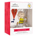 Hallmark Charlie Brown Christmas ornament packaging with red and white design.