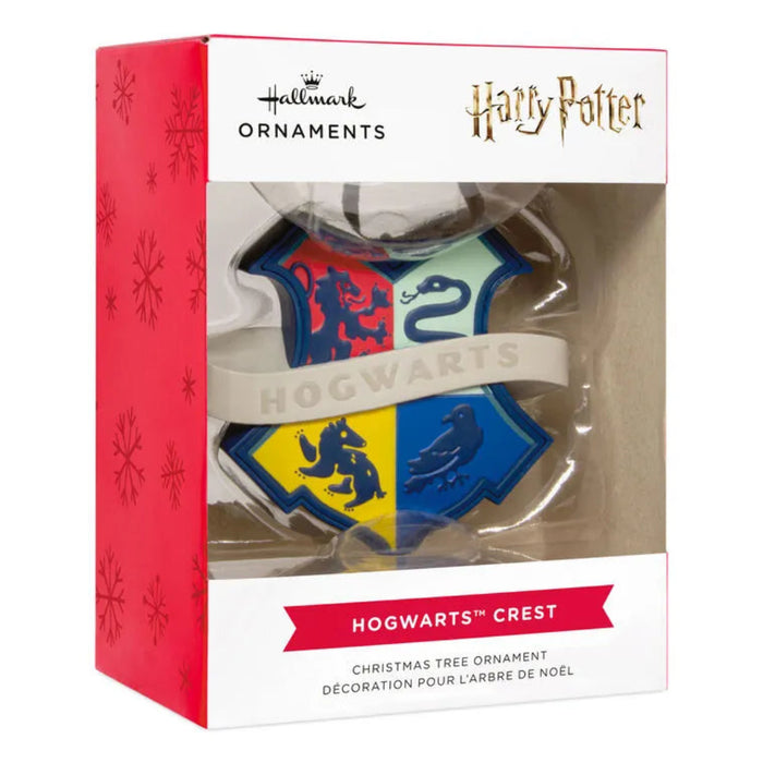 Hallmark Harry Potter Hogwarts crest Christmas ornament packaging on a white background