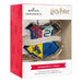 Hallmark Harry Potter Hogwarts crest Christmas ornament packaging on a white background