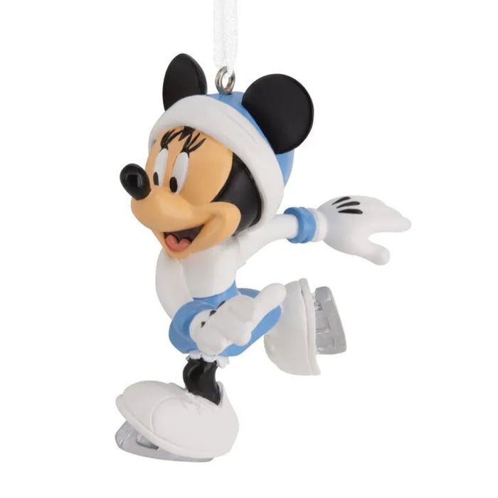 Disney Minnie Mouse  character ornament in a white and blue outfit wearing ice skates  on a white background