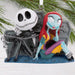 Ornament featuring Jack Skellington and Sally from 'The Nightmare Before Christmas' on a white background.