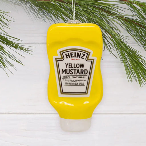 Heinz Yellow Mustard bottle ornament on a white background with greenery