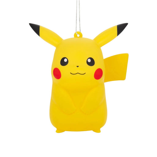 Yellow Pikachu character ornament on a white background