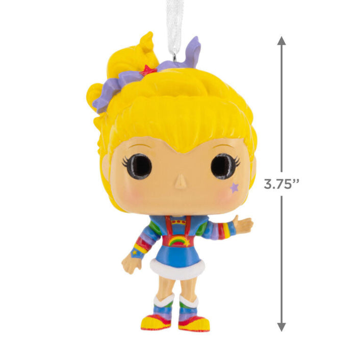 Colorful figurine with yellow hair and rainbow outfit, shown with a measurement label on a white background.