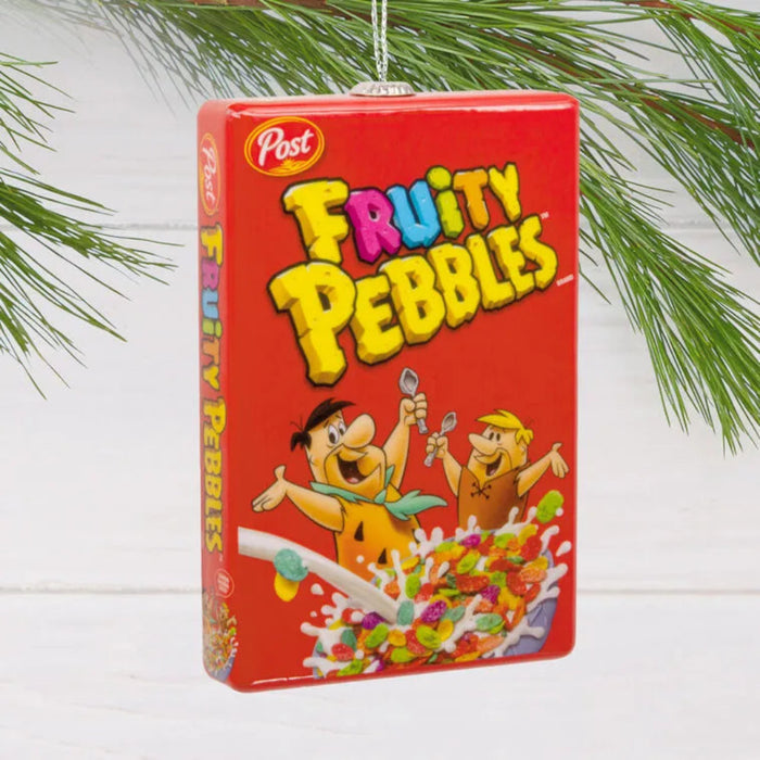 Fruity Pebbles cereal box ornament with cartoon characters on a white background