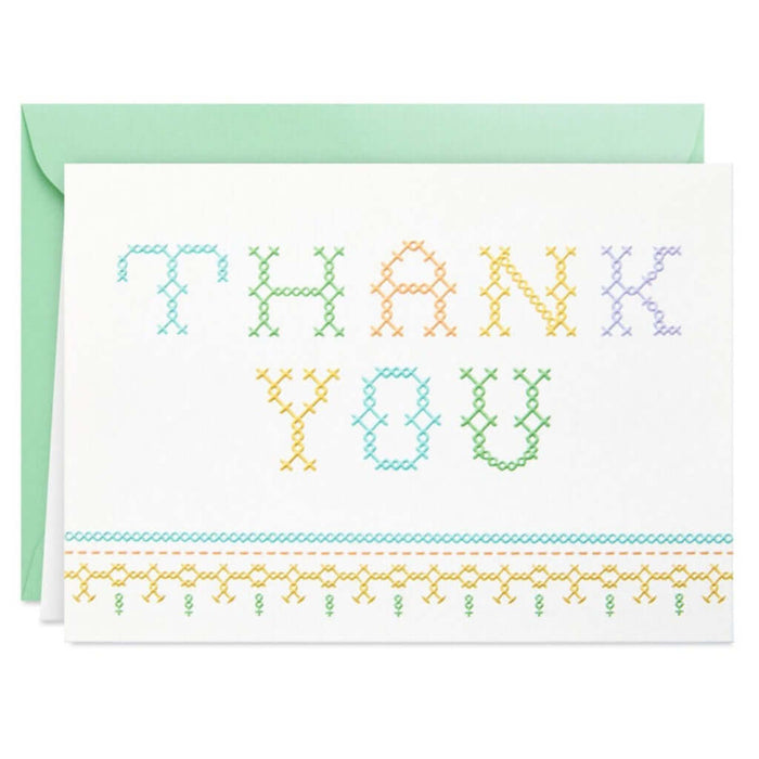 Card with 'THANK YOU' text in cross-stitch pattern and green envelope