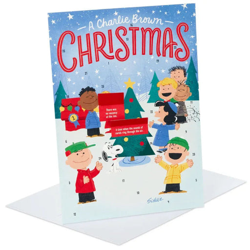 Advent calendar with Peanuts characters and 'A Charlie Brown Christmas' text on a blue background