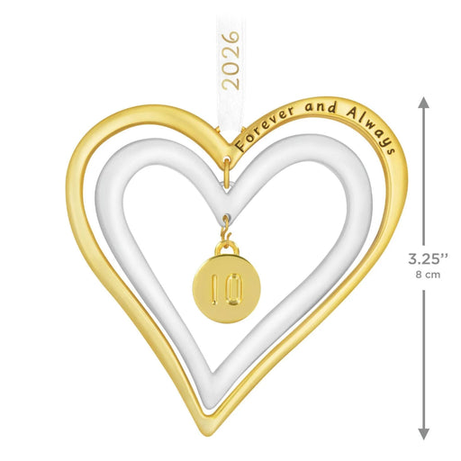 Two-toned heart-shaped ornament  with 'Forever and Always' engraving and a small round pendant, with measurements indicated.