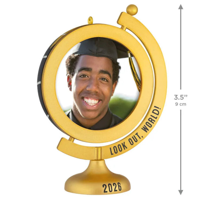 Gold graduation-themed photo frame with a person's face inside, labeled 'Look Out, World! 2026'.