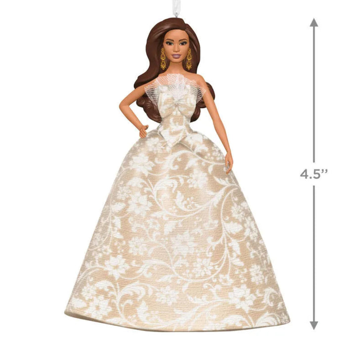 Latina Barbie doll in a white lace dress with dimensions indicated on a white background