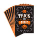 Halloween-themed card with 'Trick or Treat' text and pumpkin design on a black background.
