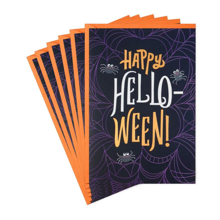 Stack of Halloween-themed greeting cards with 'Happy Hello-Ween!' text on a white background