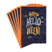 Stack of Halloween-themed greeting cards with 'Happy Hello-Ween!' text on a white background