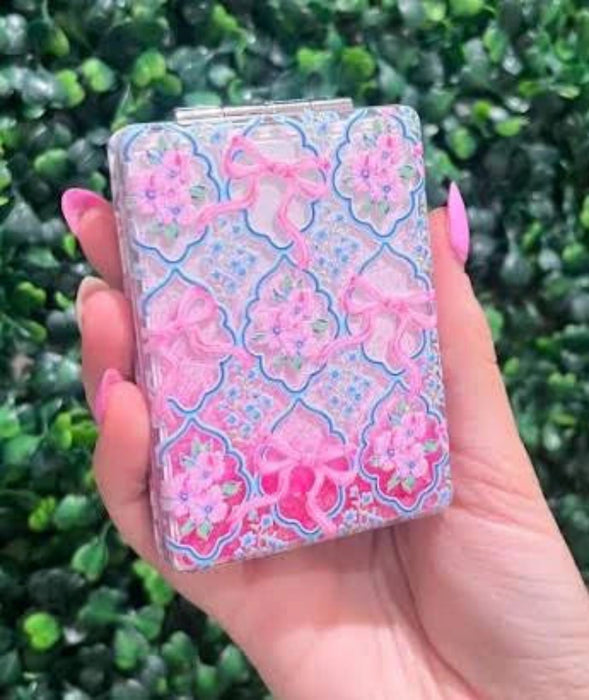 Simply Southern brings you the Compact Cosmetic Mirror a stylish, purse-sized mirror that keeps you looking polished wherever the day takes you.