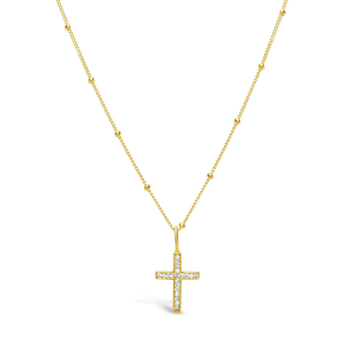 The delicate chain enhances the timeless design, creating a piece that is both meaningful and sophisticated.