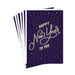Stack of greeting cards with 'Happy New Year to You' text on a purple background
