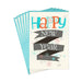 Stack of greeting cards with 'Happy New Year' text on a white background