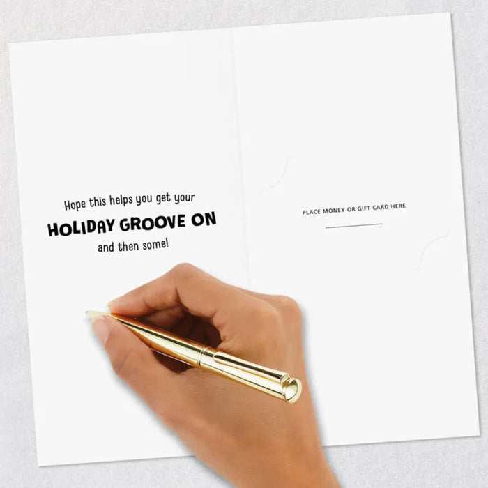 Hand holding a gold pen over a card with text and a space for money or a gift card.