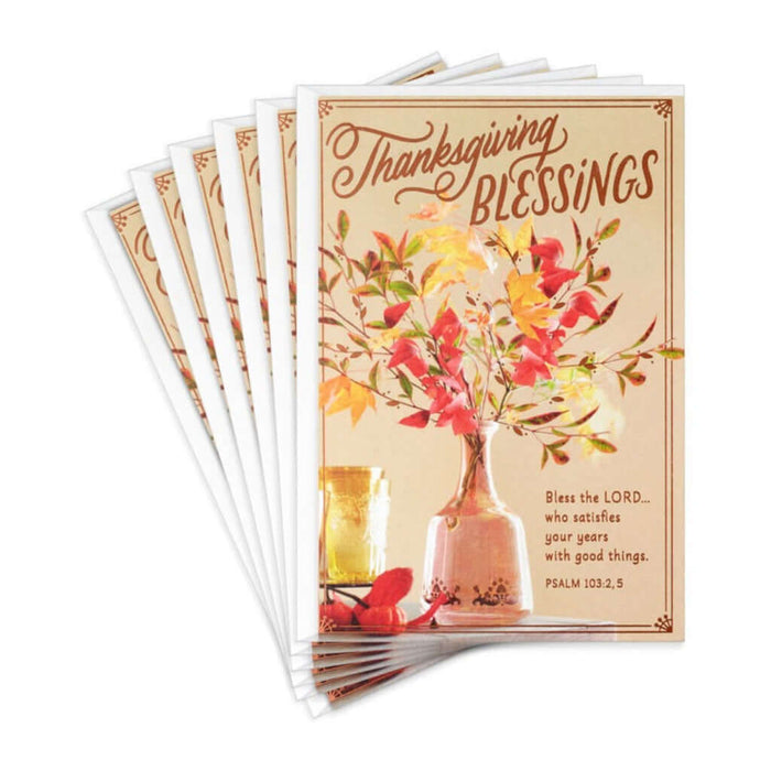Pack of Thanksgiving greeting cards with floral leaves design and text.