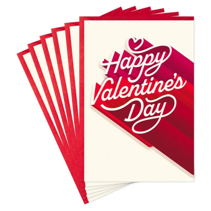  Stack of Valentine's Day cards pack features loving wishes in an eye-catching cursive font with long red shadow detail on a cream background