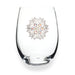 Clear glass with decorative gemstone design on a white background