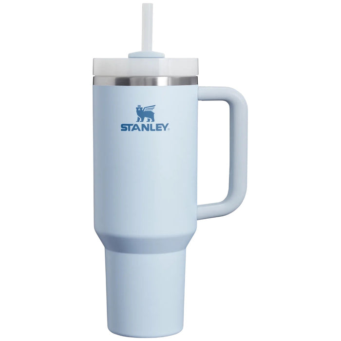 Light blue Stanley mug with handle and straw on a white background
