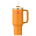 Orange Stanley mug with handle and straw on a white background