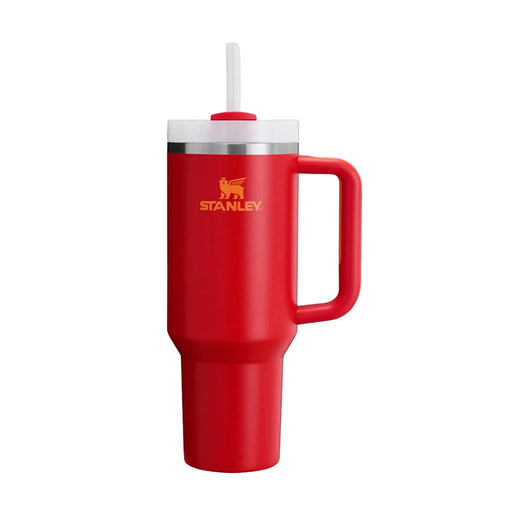 Red Stanley mug with a handle on a light gray background