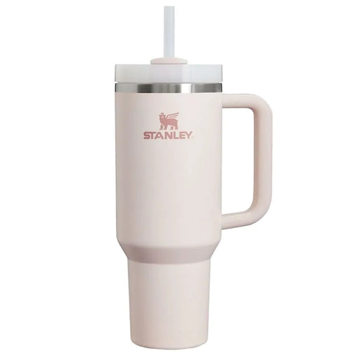Stanley mug with handle and straw on a white background