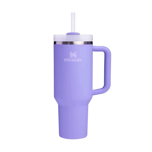 Purple Stanley tumbler with handle and straw on a white background