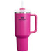 Pink Stanley mug with handle on a white background