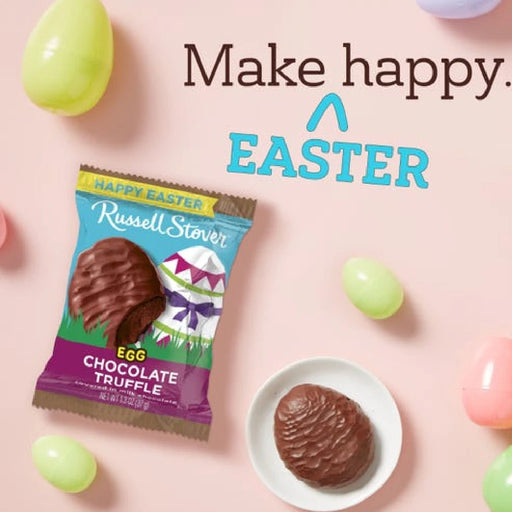 Delicious Russell Stover chocolate truffles, enveloped in creamy milk chocolate, displayed in an elegant packaging.