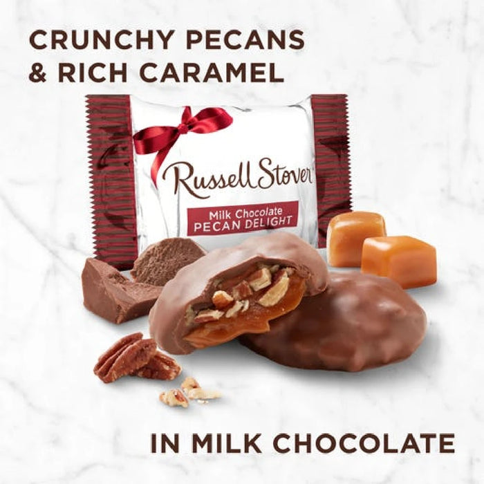 A Russell Stover coconut nest, featuring a milk chocolate exterior and a soft coconut center, presented on a white background.