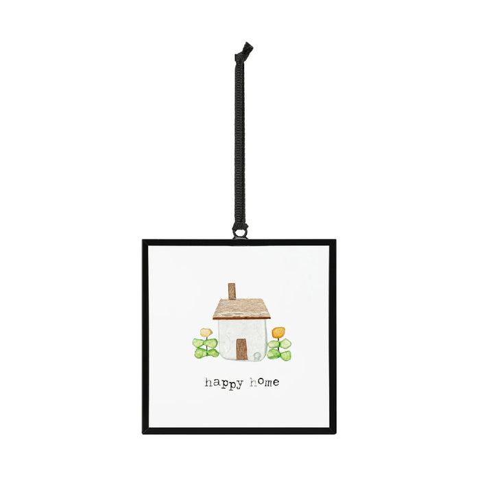 Framed artwork illustrating a joyful home, filled with bright colors and a sense of comfort.