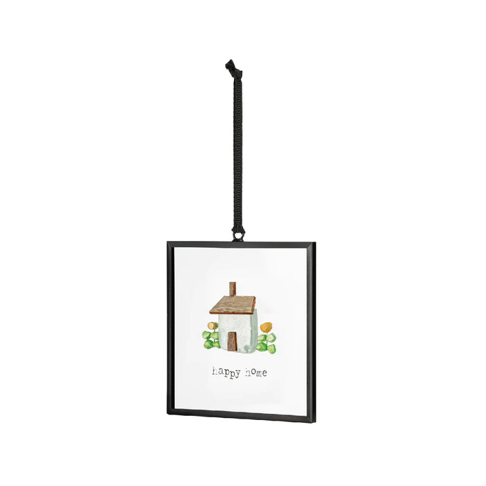 Cheerful framed print of a home, emphasizing a warm and inviting environment with lively colors.