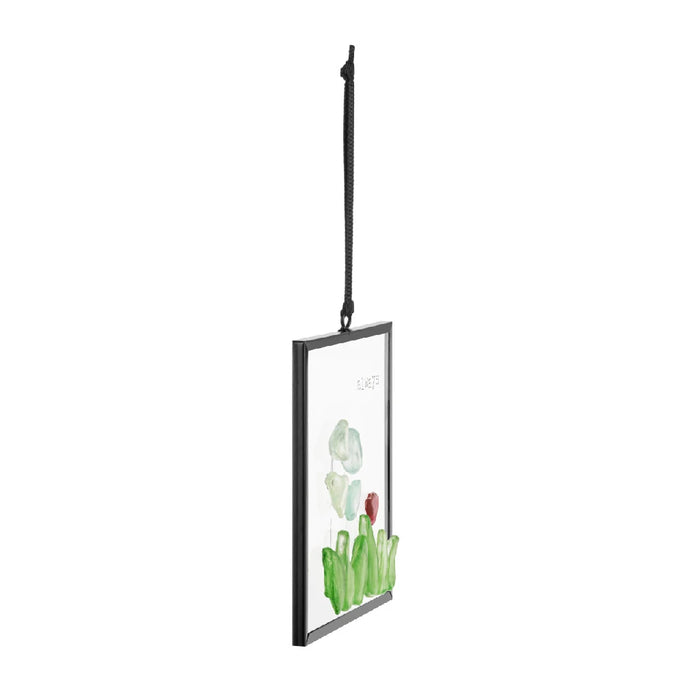 A small card displaying a vibrant floral design with a sun catcher illustration.