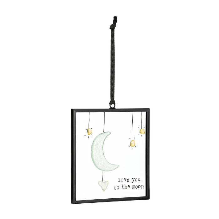 A charming ornament displaying the words "I love you to the moon and back," perfect for expressing affection.