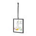 A black-framed ornament featuring a photo of a baby holding a balloon, hanging decoratively.