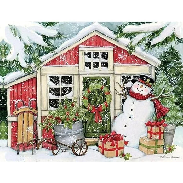 Boxed set of Lang Snowman’s Farmhouse Christmas cards showing a smiling snowman in front of a rustic farmhouse decorated for the holidays.”