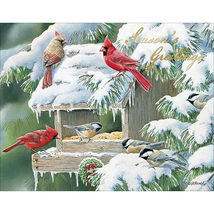 Cardinal and chickadee birds at a snowy bird feeder with 'Season's Greetings' text.