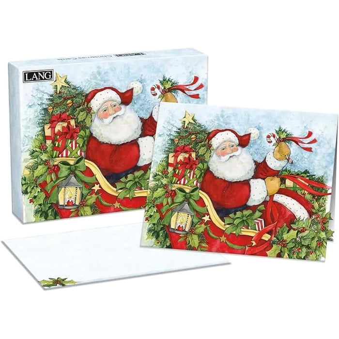 Box of Lang Christmas cards featuring Santa Claus delivering gifts in a festive winter scene.