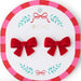 Red bow earrings on a '2 Chic' branded card with a colorful circular border.